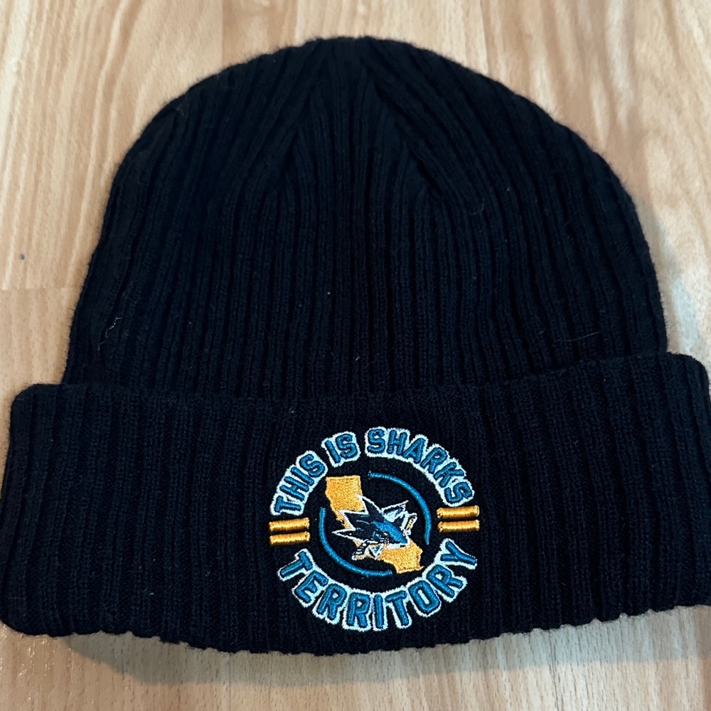Fanatics Black Beanie Hat with Blue and Gold Embroidered Sharks Logo